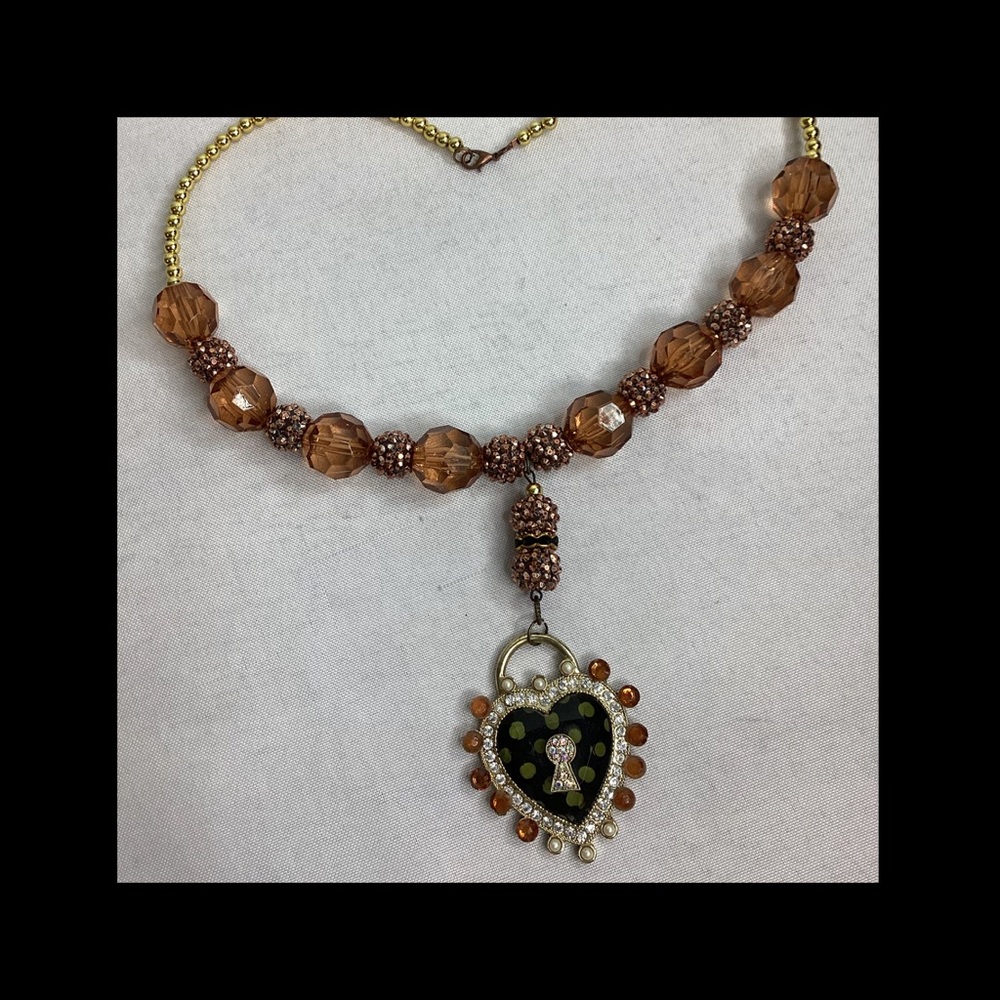 Elegant Brown Beaded Necklace with Heart Pendant